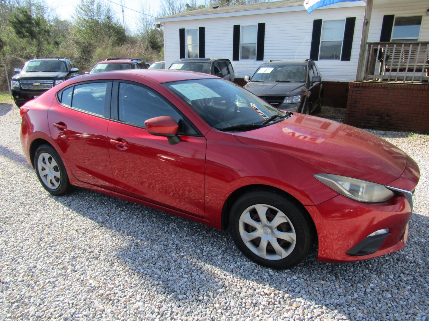 2016 Red Mazda MAZDA3 i Sport AT 4-Door (JM1BM1T74G1) with an 2.0L L4 DOHC 16V engine, Automatic transmission, located at 15016 S Hwy 231, Midland City, AL, 36350, (334) 983-3001, 31.306210, -85.495277 - Photo#0